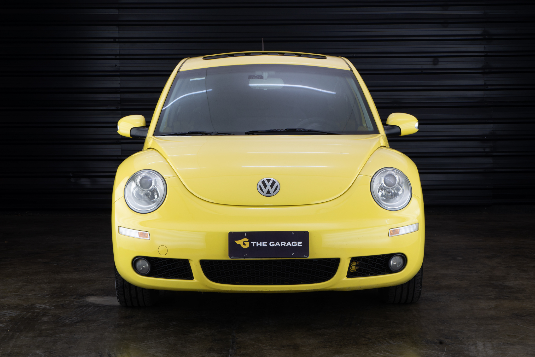 2009 Volkswagen new beetle amarelo a venda the garage