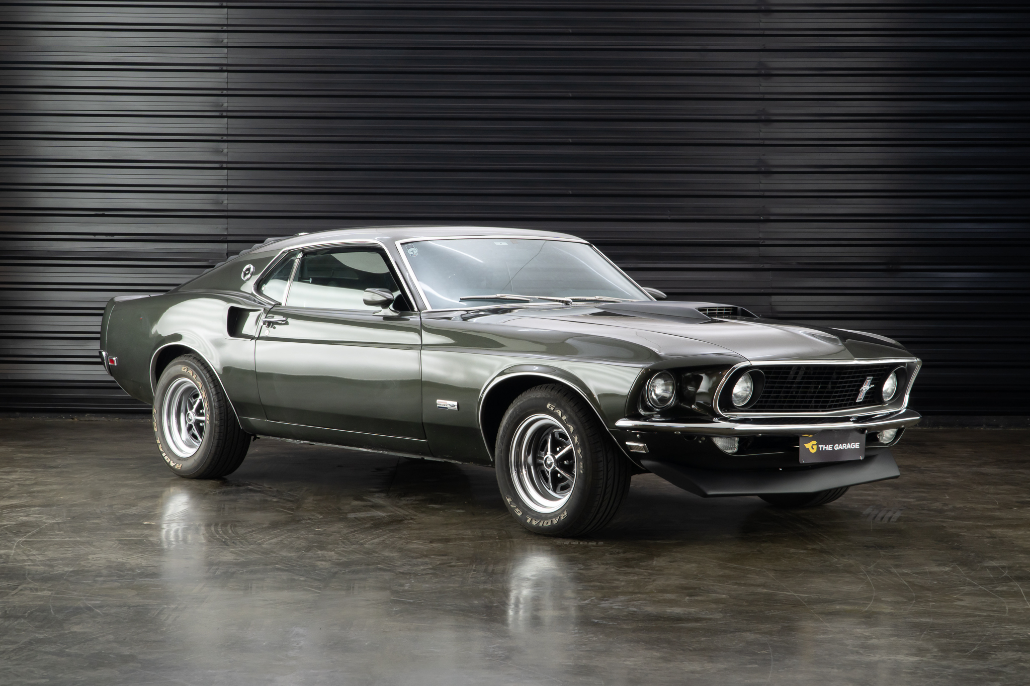 1969 Ford Mustang Fastback verde a venda the garage