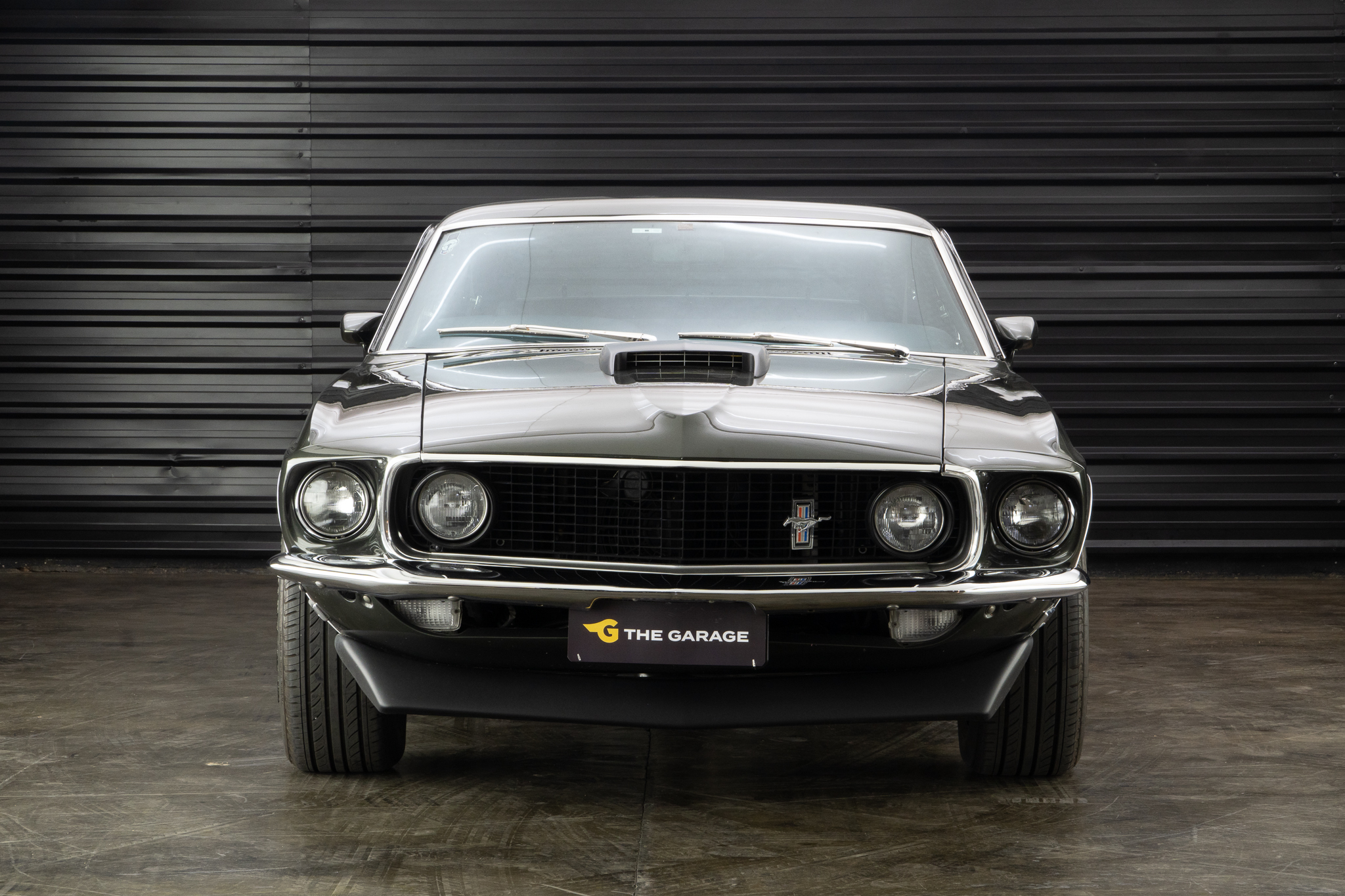 1969 Ford Mustang Fastback verde a venda the garage