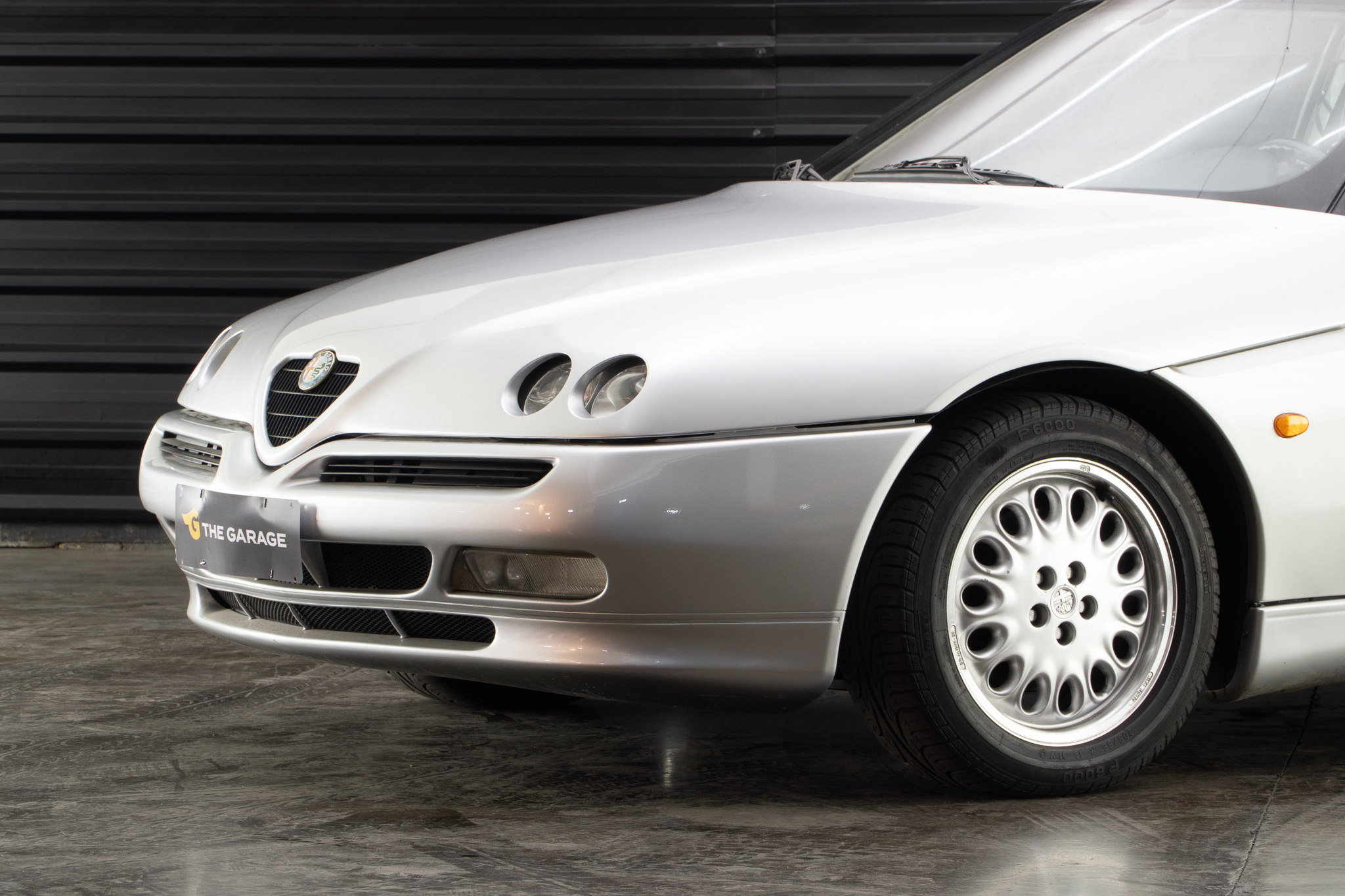 1996 Alfa Romeo Spider prata a venda the garage for sale